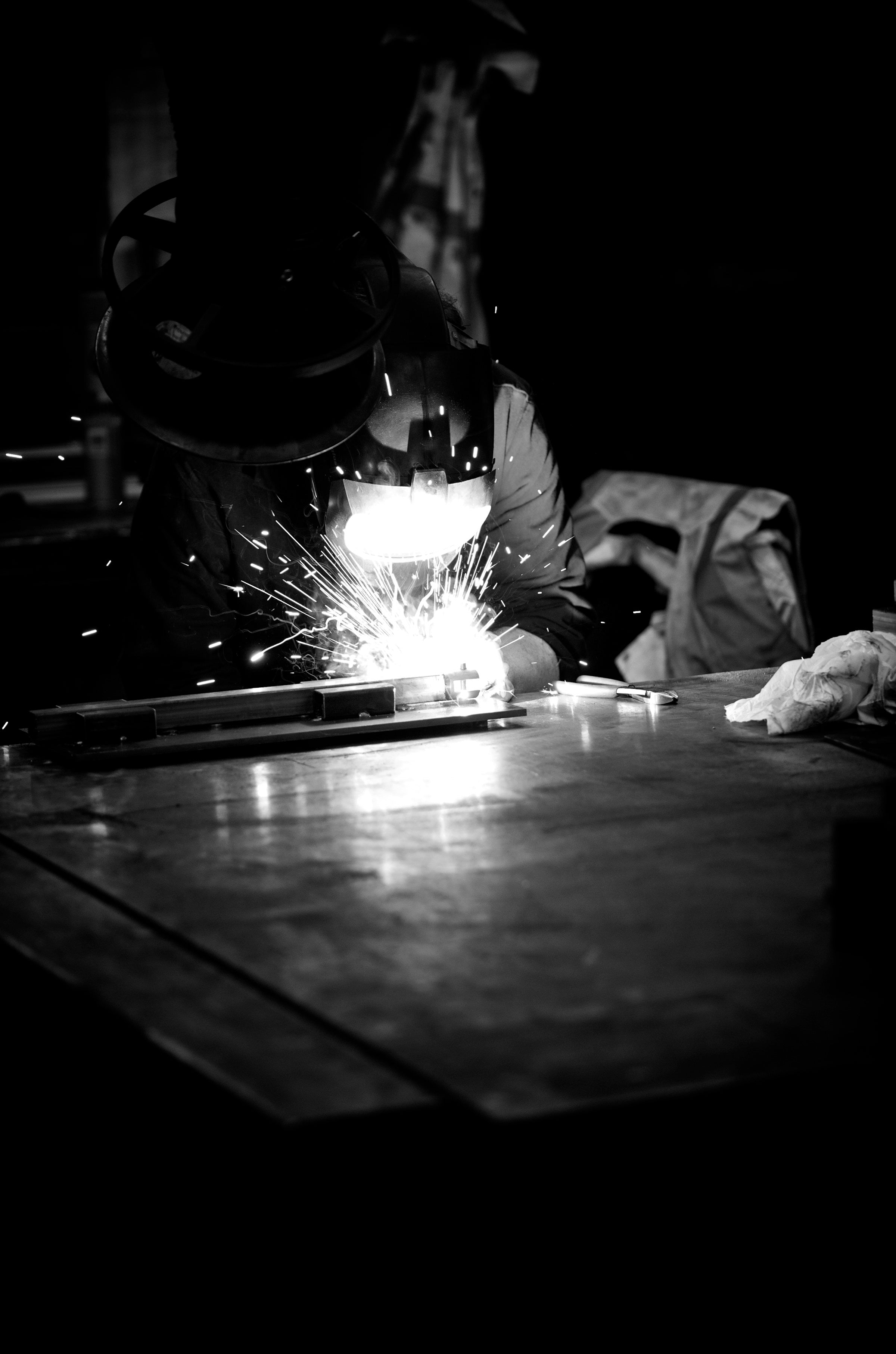 Welder sparks in the dark